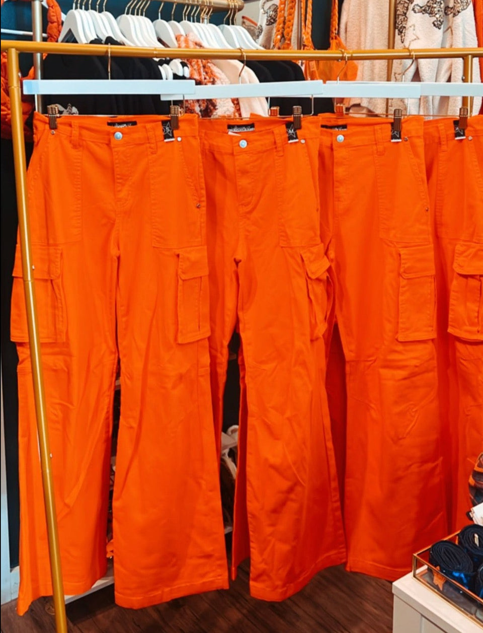Shiesty Cargo Pants - Orange On Rolling Rack