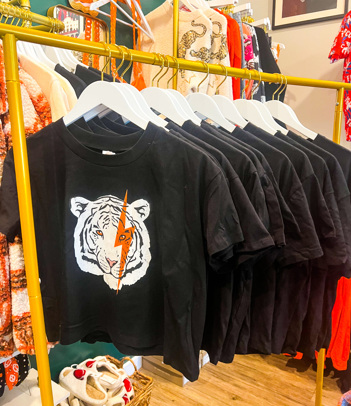 Lightning Tiger Crop Tee On A Rolling Rack IRL